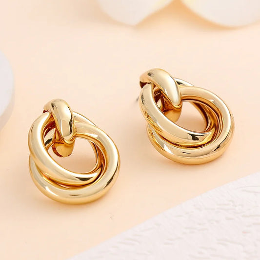 Gold Metal Twisted Earrings
