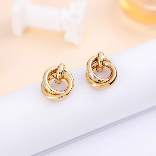 Gold Metal Twisted Earrings
